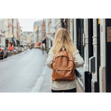 Load image into Gallery viewer, Model wearing Italian leather backpack for women and men