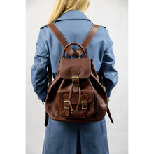 Load image into Gallery viewer, Pelletteria Italiana, Model wearing Italian leather backpack for women 